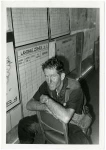 An exhausted Mitchell is shown here during the April 1975 evacuation of Saigon. He was on the last helicopter to fly out