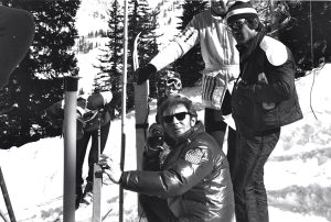 Butch Hoffman and Michel Rudigoz assist with timing at a Snowbird race