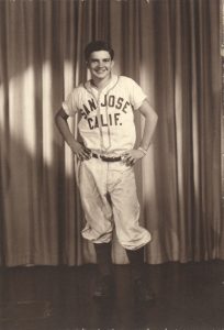Gary DeSeelhorst modeling his high school baseball uniform, circa 1952-53.