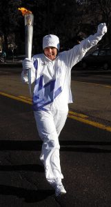 Raelene Davis runs in the Olympic Torch Relay for the 2002 Winter Olympics.