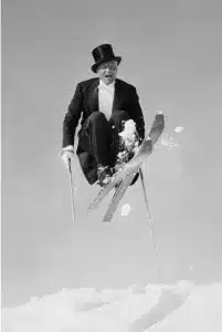 Leif skiing in a tuxedo.