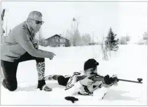 Leif Odmark giving tips to a young skiier in the bialathon